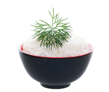 一碗简单的米饭精巧地被一盘羽毛般的鱼夹着白种背景拍摄营养丰富绿色图片
