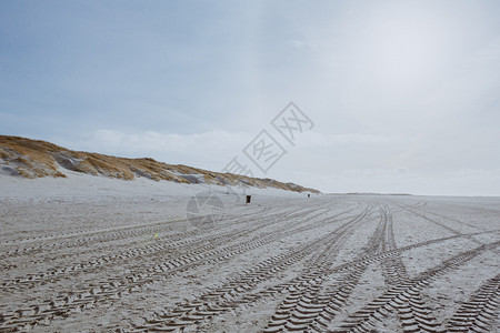 阿姆鲁天际线田园诗般的德国SchleswigHolstein北海Amrum岛的长无尽海滩下美丽安静和放松的沙丘景观图片