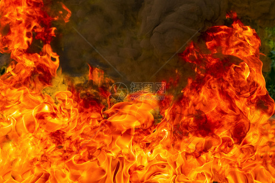 危险美丽的抽象艺术黑色背景的火焰燃烧红色热火花上升烈橙光闪耀的飞行粒子黄色图片