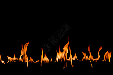 辉光力量热的抽象艺术黑色背景的火焰燃烧红色热火花上升烈橙光闪耀的飞行粒子图片