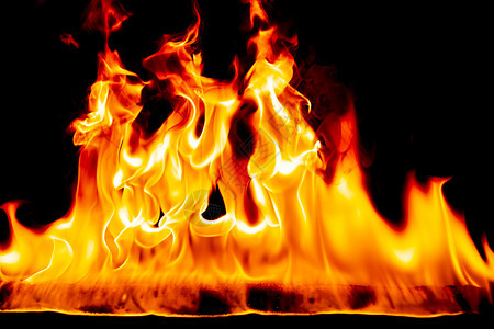 危险抽象艺术黑色背景的火焰燃烧红色热火花上升烈橙光闪耀的飞行粒子美丽烧伤图片