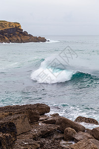 海洋岸带泡沫风力的移动波浪绿石水海户外环境的图片