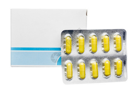 化学健康药盒和丸泡囊黄色胶白色底面的黄胶囊卫生保健图片