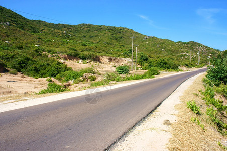 越南公路横沙丘丛林农村或山丘旅行路线发现Vetianam蓝天下农村地貌白天亚洲人蓝色的未来图片