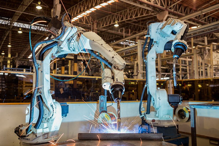 工业机器人是汽车厂新程序的试运行测程序电子产品现代的机器人技术图片
