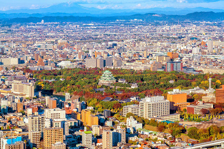 夜晚,人群天际线名古屋市与日落时本名古屋城堡旅行夜晚背景