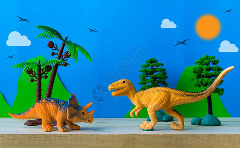 肉食动物斗争野生模型背景上的恐龙战斗场景猎人图片