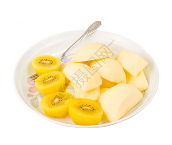 营养金果和苹切片盘子里有叉小吃果汁图片