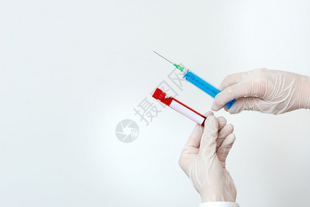 血液样本与注射器背景图片