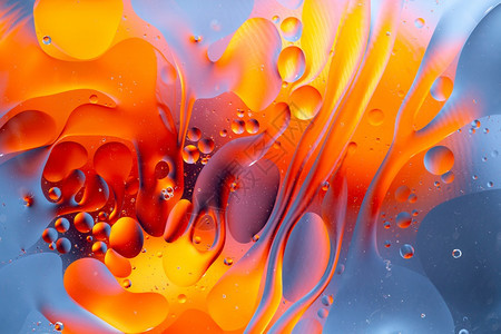 水滴油混合产生的抽象背景水油混合产生的抽象背景迷幻降低图片
