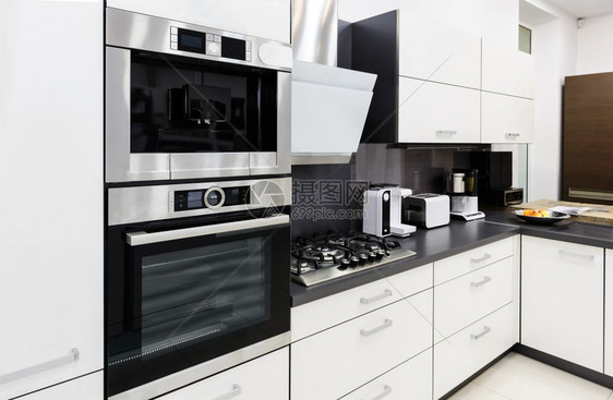 火炉现代豪华高尖黑色和白档额奢侈品室内厨房清洁设计烤箱苹果图片
