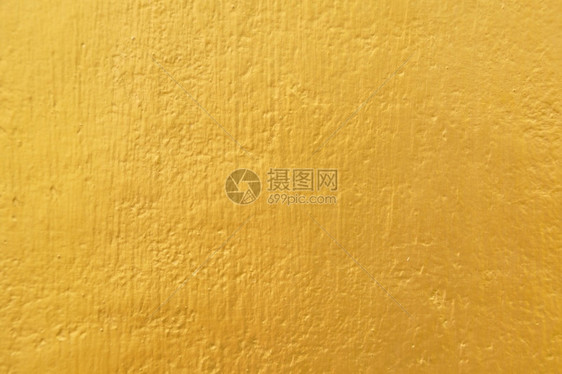 垃圾摇滚有质感的颜色水泥墙纹理背景上的金漆图片