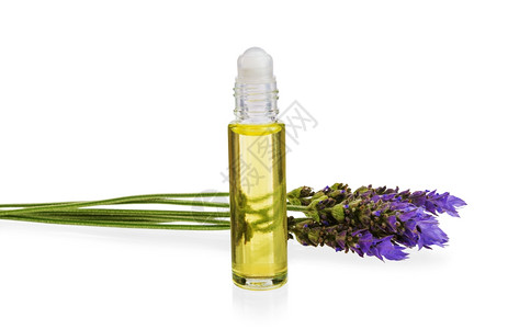 草本质基的白底孤立天然芳香疗法作为天然芳香疗法基本石油和新鲜紫色花朵图片