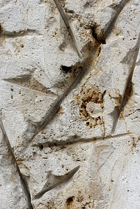 外部的石灰装饰风化质外部墙壁或生锈建筑楼层的外墙或地表风化石质图片
