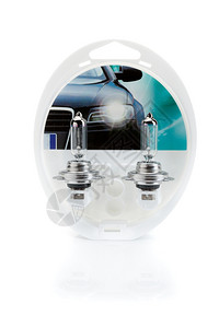 两台H7灯用于塑料泡的汽车灯头在白色上隔离的电卤素图片
