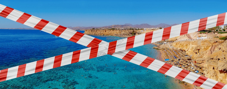 伞关于沙姆伊赫海岸线背景情况的保护磁带载于关沙姆伊赫海岸线的背景图埃尔蓝色的图片