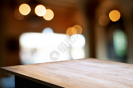 最佳在蒙太奇咖啡馆或厨房背景模糊的餐厅咖啡或厨房背景面前木制桌命令墙图片