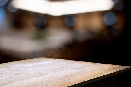 在蒙太奇咖啡馆或厨房背景模糊的餐厅咖啡或厨房背景面前木制桌抽象的零售商业图片
