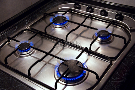 厨房炉灶的详细图像烹饪燃烧照片图片