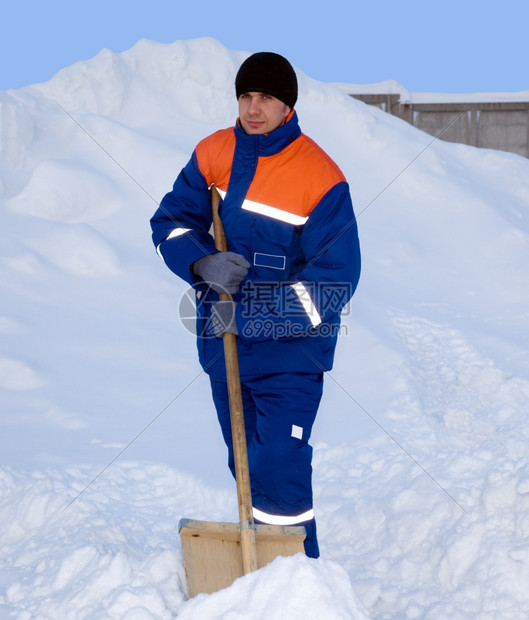 连体工作服活动冬季西装工人包括雪下背景的夹克和长裤子套装图片