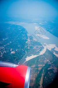 从飞机空中看天从窗户中运输概念自然多云的视窗图片