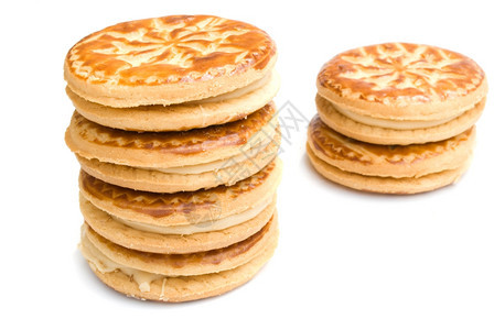 曲奇饼白色背景上孤立的饼干堆积面包店糕点图片