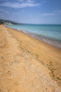 小路海滩蓝天空和度假胜地的景象沙滩海浪岸滨和景印记安静的图片