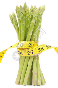 营养春天孤立的绿色化带胶捆绑起来的Asparagus新鲜图片