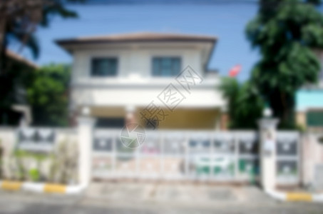 提供商业背景模糊现代家庭住宅建筑具有模糊郊区的现代图片