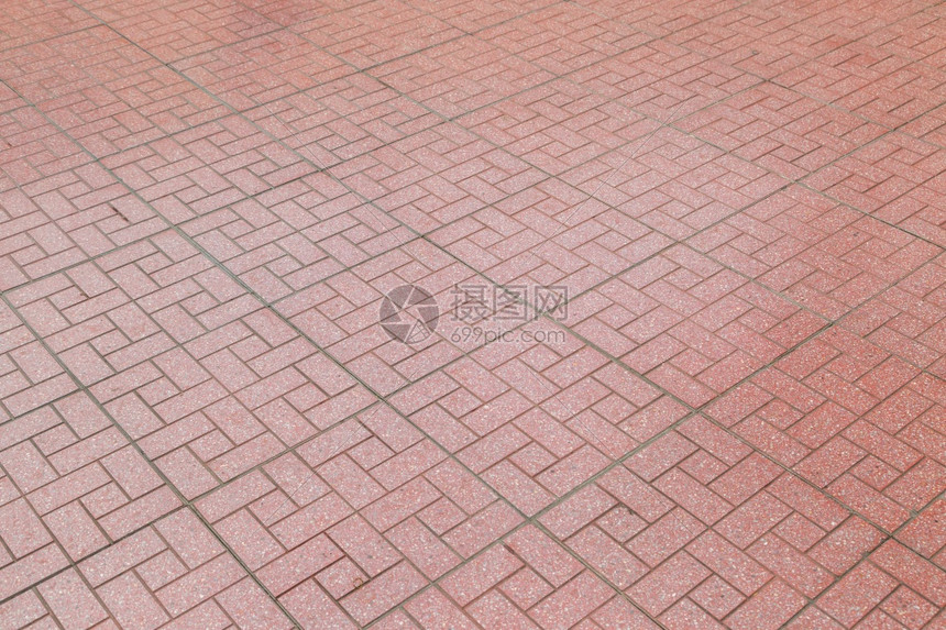 结石优质的红砖在人行道背景上铺石头肮脏的图片
