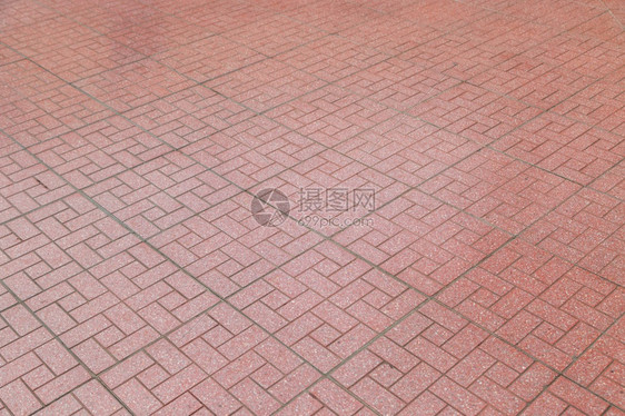 外部的城市红砖在人行道背景上铺石头平图片