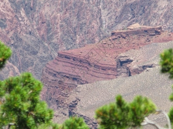 美国亚利桑那州大峡谷公园红岩在7月一个阴云天团结的黄色空图片