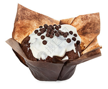 吃美味的巧克力松饼在白色背景中被孤立非常图片