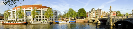 早晨目的地家园阿姆斯特丹市中心城与荷兰Amstel的全景图片