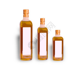 玻璃白色背景的橄榄油瓶黄色新鲜图片