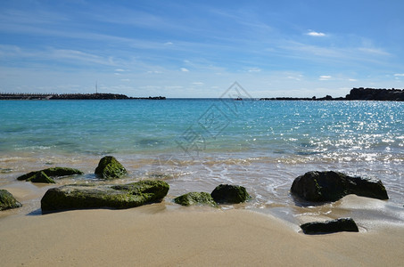 西班牙加那利群岛波多黎各PlayadeAmadores海滩详情普拉亚冷静的海景图片