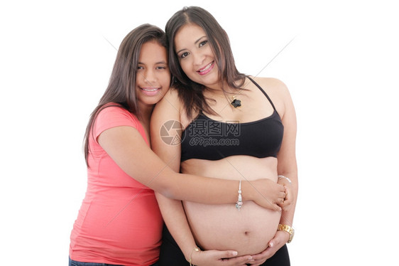 美丽的孕妇和女儿以及她的多米尼奇脸乐趣图片