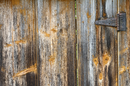 结构体古董一扇纹质的旧木制门细节关上颜色图片