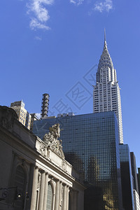 2014年6月日在美国繁忙的纽约市著名地标上纽约州立大厦接近视苹果六月云图片
