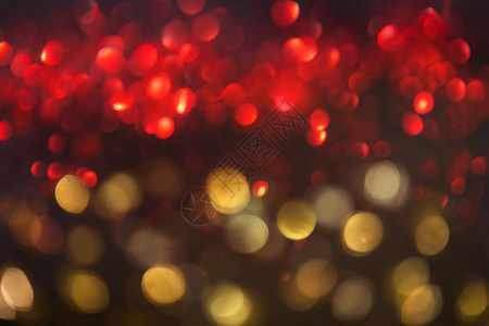 金光圣诞节日会背景摘要闪亮与bokeh的金色亮光相交织有质感的抽象金属图片