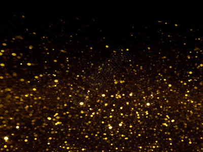 带有bokeh效果的金光色上覆背景包括复制空间闪发光金子散景图片
