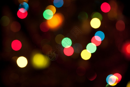 模糊明亮的色彩多圣诞节灯光抽象背景红色的散焦新图片