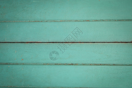 旧木墙绿色腐烂和雨水侵蚀装饰木头抽象图片