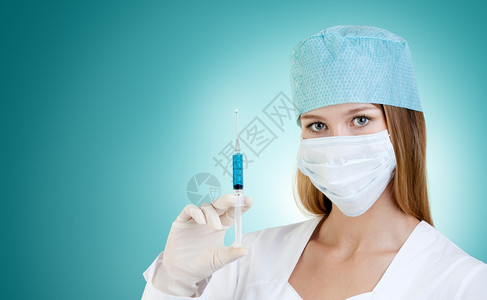 实验室注射科学女护士准备与蓝液轮筒一起工作图片