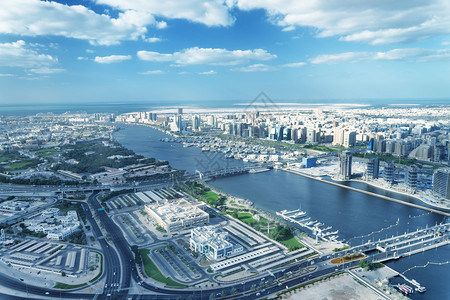 天空十二月迪拜阿联酋2016年2月0日从直升机空中城市天际线迪拜阿联酋2016日从直升机迪拜空中城市天际线每年吸引20万图片