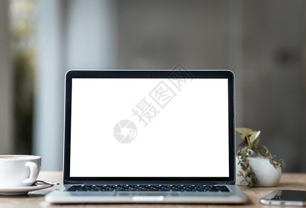 现代的咖啡店白色屏幕在咖啡厅背景的桌子上用空屏幕咖啡杯和智能手机抽装提电脑白色屏幕笔记本图片