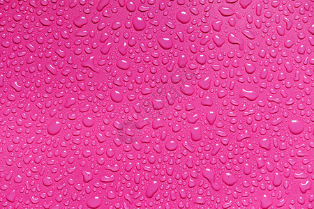粉红色背景的水滴用于设计和图案背景自然颜色凉爽的图片