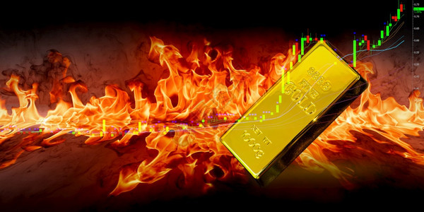 美丽的金融以交易表背景点火烧的金牛条图片