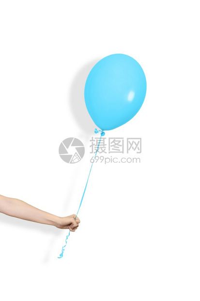 吹手握蓝色气球派对或礼物概念蓝色气球和手在白背景上隔离手握蓝色气球派对或礼物概念蓝色气球和手在白背景上隔离抓住或者图片