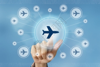 带有全球联网概念的推动飞行出航旅按键业务手推飞机喷射航班程图片